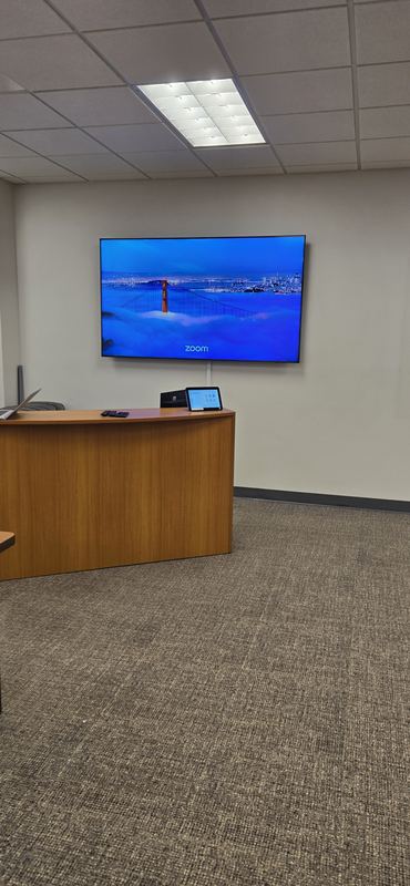 Touch-panel control — Room control on the credenza — one panel to start, join, and share.